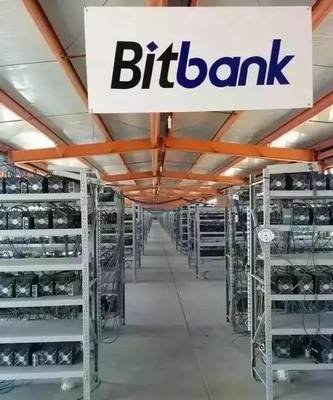 Image of a large-scale cryptocurrency mining farm with numerous mining rigs.